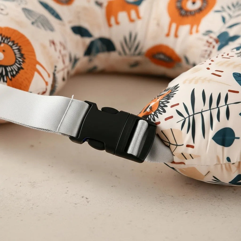Noa Nest nursing pillow with waist strap and raised support edge for newborn feeding comfort